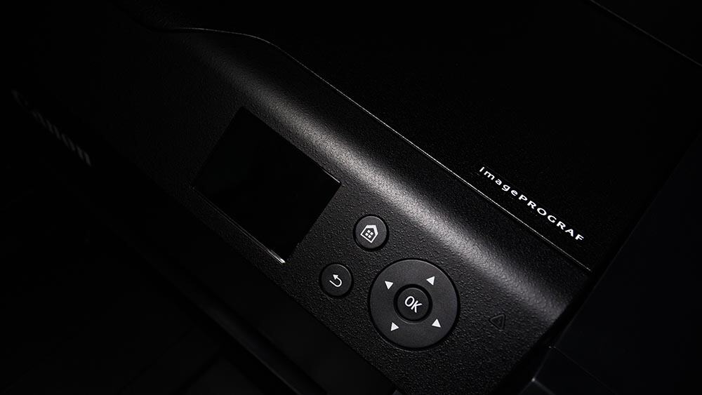 Bedieningsknoppen van een fotoprinter van Canon