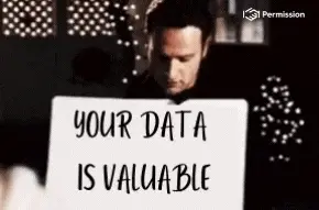 Scene uit Love Actually waarbij SImon bord omhoog houdt met 'Your data is valuable'